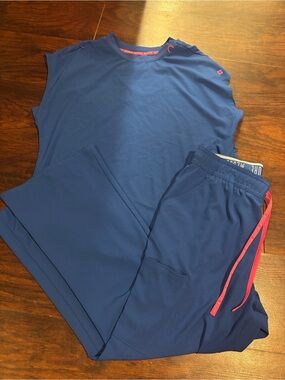 Med Couture Navy Blue Scrub Set with Pink Accent